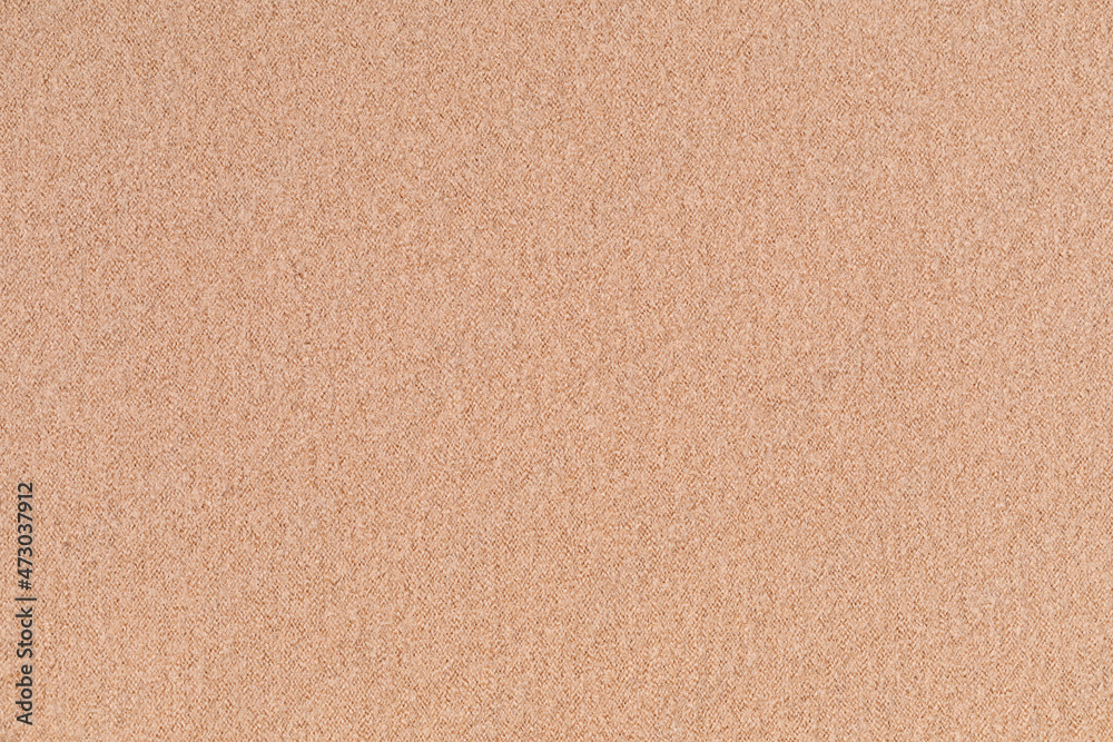 Fototapeta premium Knitted woolen or cashmere texture background. Warm sweater, pullover pattern closeup