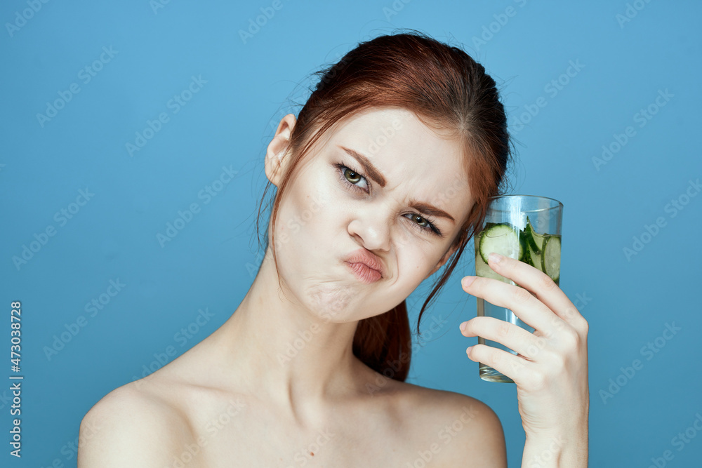 pretty woman with cucumber drink health vitamins pretty woman with cucumber drink health vitamins