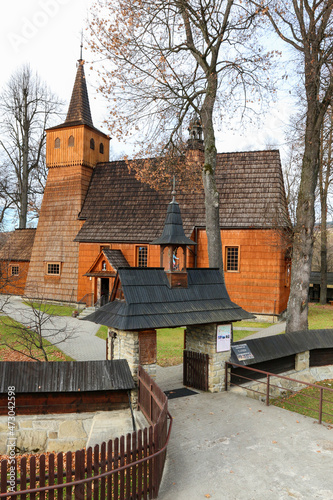 LOPUSZNA, POLAND - NOVEMBER 14, 2021: Old wooden church in Lopuszna, Poland. photo