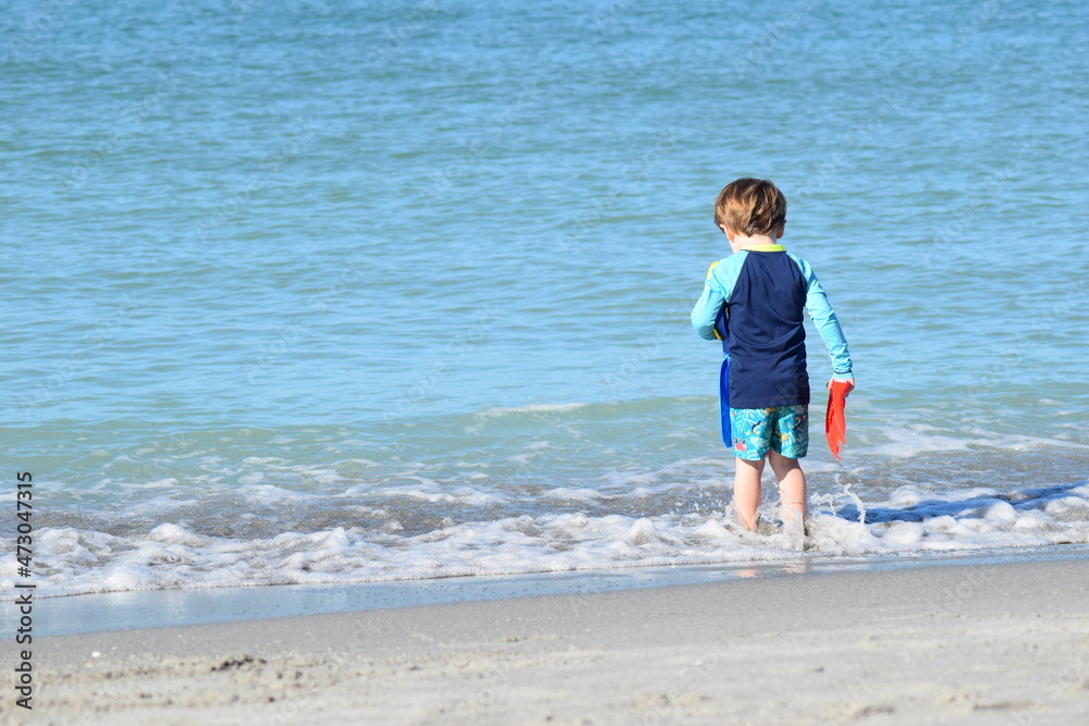 boy water waves beach surf child play ocean