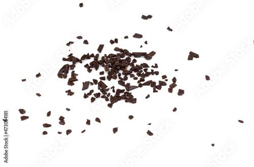 Chocolate sprinkles isolated on white background. Grated chocolate isolated on white background. © Sanja