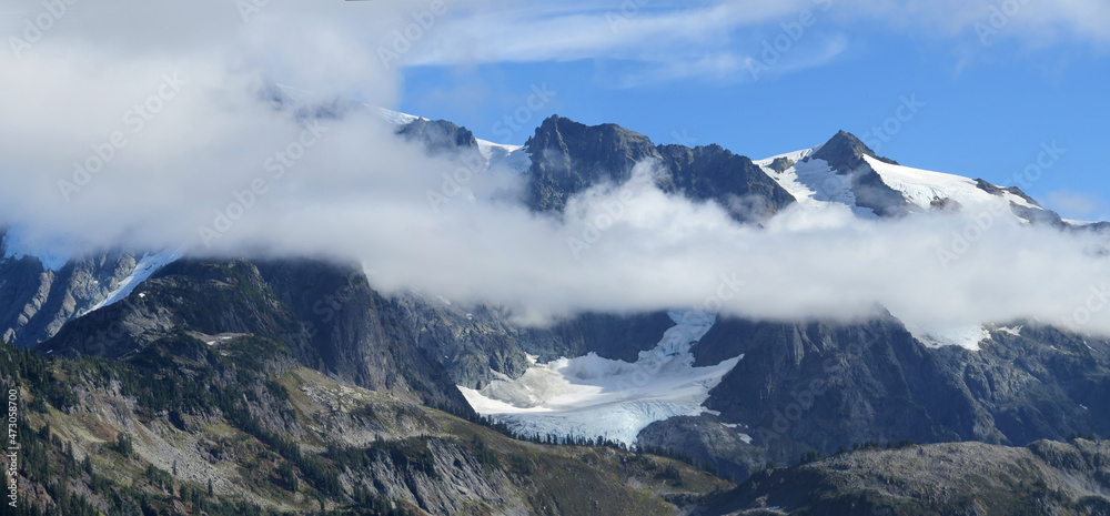 Mount Shuksan hiding behind white clouds