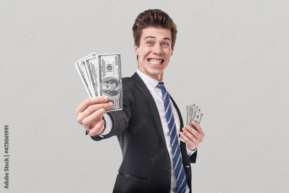 Funny businessman with dollar bills Funny businessman with dollar bills