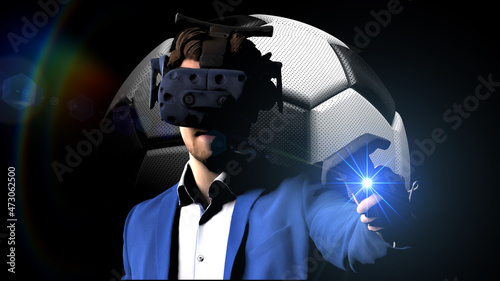 Foto White-black soccer ball and businessman in elegant blue suit with VR headset and controller under blue lens flare