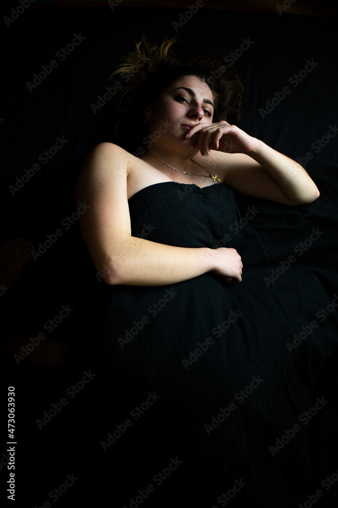 Fototapeta premium Girl on a black background