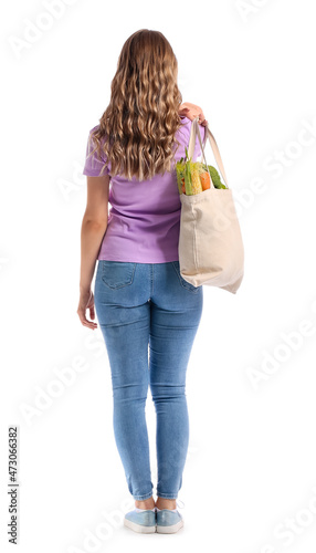 Young woman holding eco bag...
