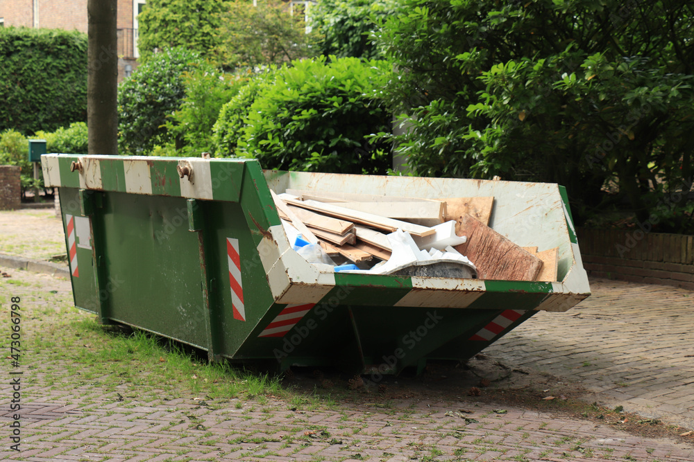 Loaded garbage dumpster Loaded garbage dumpster
