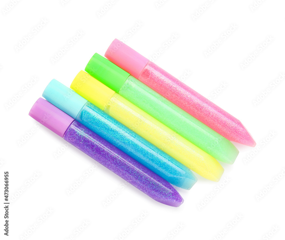 Colorful glitter glue on white background Colorful glitter glue on white background