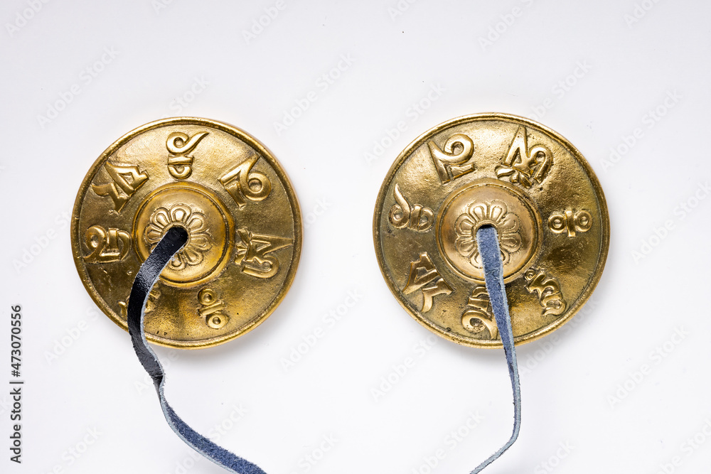 Tibetan Tingsha Cymbals, Mane Padme Hum Symbols Embossed Hand Tuned from Nepal Stock Photo