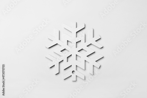 Beautiful snowflake on white background