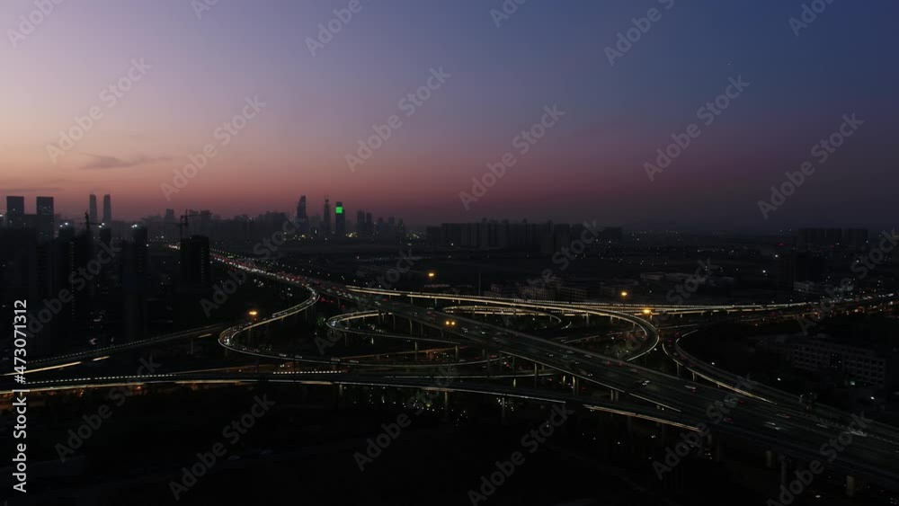 busy traffic road with city skyline in hangzhou china busy traffic road with city skyline in hangzhou china