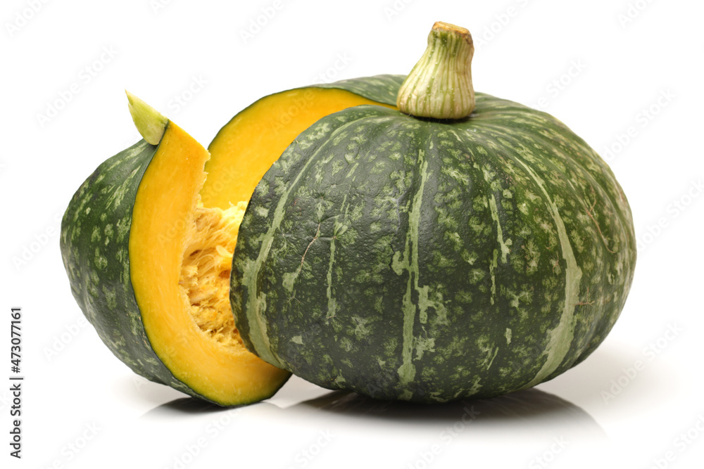 Orange and green pumpkin on white background