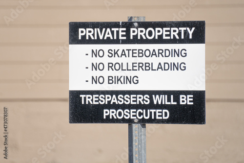 Sign on private property restricting activities