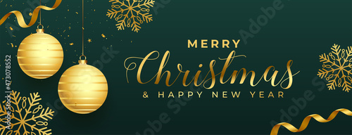 lovely golden merry christmas and new year banner with realistic elements photo