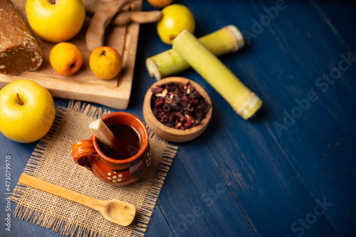 Ponche de Frutas. Christmas fruit punch is an infusion that is consumed in Mexico, traditionally during posadas and Christmas..Served in a clay cup called cantarito