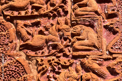 Terracotta Temple Wall : Beautiful terracotta carving scenes of Ramayana and Mahavarat on the walls of ancient Hindu Terracotta Temple at Guptipara Brindaban Chandra's Math, India.