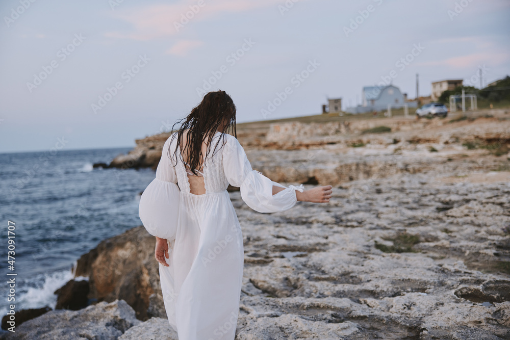 Woman in white dress nature walk travel vacation freedom Woman in white dress nature walk travel vacation freedom