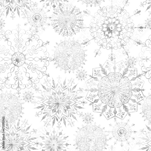 Watercolor seamless pattern with frozen flowers, leaves and silver snowflakes, isolated on white background