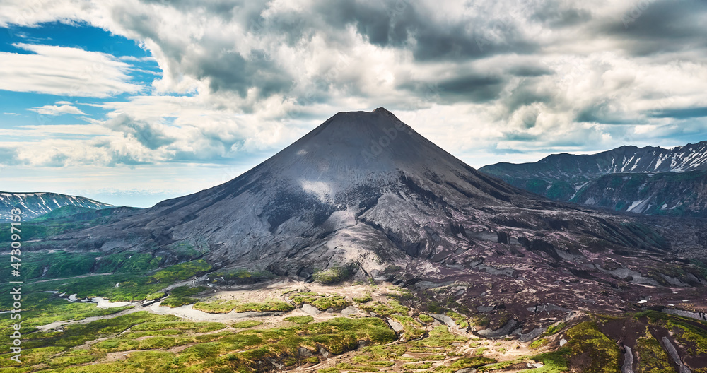 Volcanoes of Kamchatka, Russia. Travel and tourism on the Kamchatka peninsula. Adventure with active hiking and mountaineering