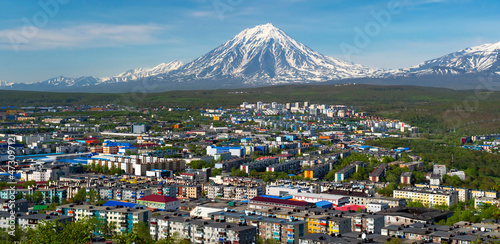 Kamchatka Peninsula, Russia. Petropavlovsk-Kamchatsky, city architecture on the background of volcanoes. Russian tourism 