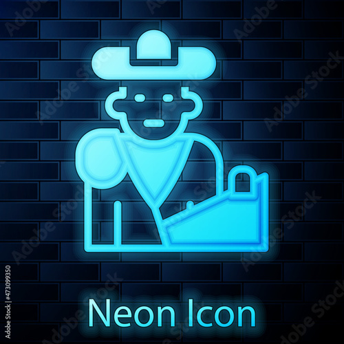 Glowing neon Spain bullfight, matador icon isolated on brick wall background. Traditional Spanish entertainment. Vector
