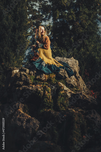 beautiful shamanic woman in the nature. © jozefklopacka
