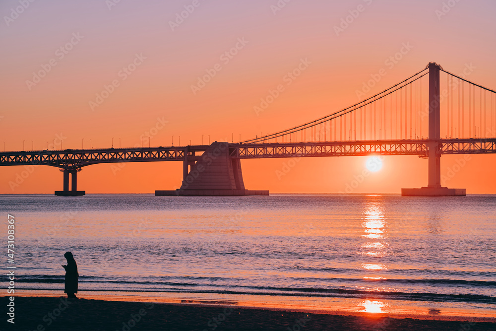 ocean and bridge at sunset, kwang an li beach in Busan ocean and bridge at sunset, kwang an li beach in Busan