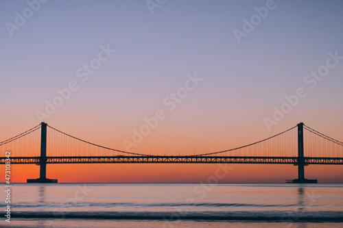 ocean and bridge at sunset, kwang an li beach in Busan