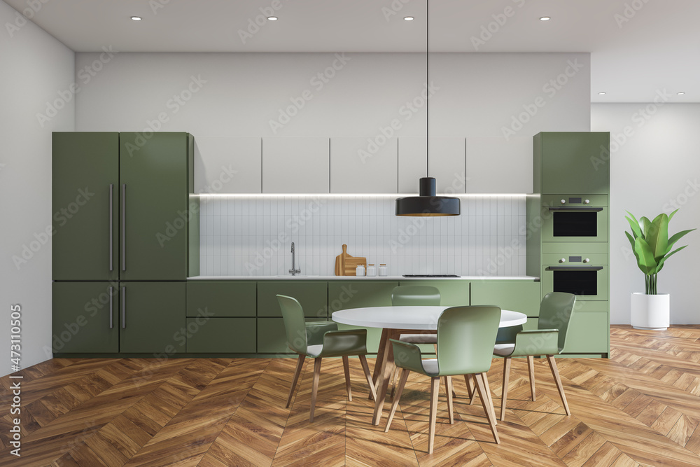 White and green kitchen interior with table and chairs, parquet floor and plant White and green kitchen interior with table and chairs, parquet floor and plant