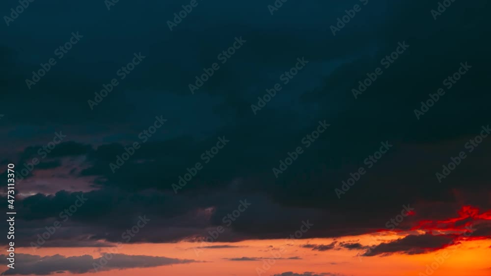 4K Sunset Cloudy Sky With Fluffy Clouds. Sunset Sky Natural Background. Sunrays, sunray, ray, Dramatic Sky. Sunset Time Lapse Time-Lapse In Yellow, Orange, Pink Colors. Day To Evening Transition 4K Sunset Cloudy Sky With Fluffy Clouds. Sunset Sky Natural Background. Sunrays, sunray, ray, Dramatic Sky. Sunset Time Lapse Time-Lapse In Yellow, Orange, Pink Colors. Day To Evening Transition