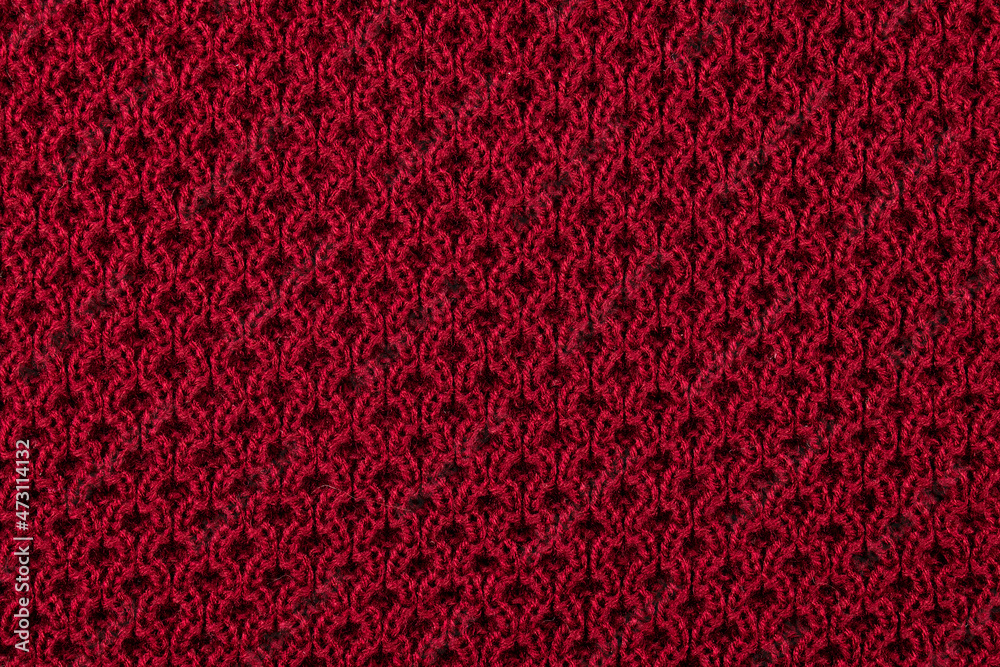 Burgundy knitted pattern textured background Burgundy knitted pattern textured background