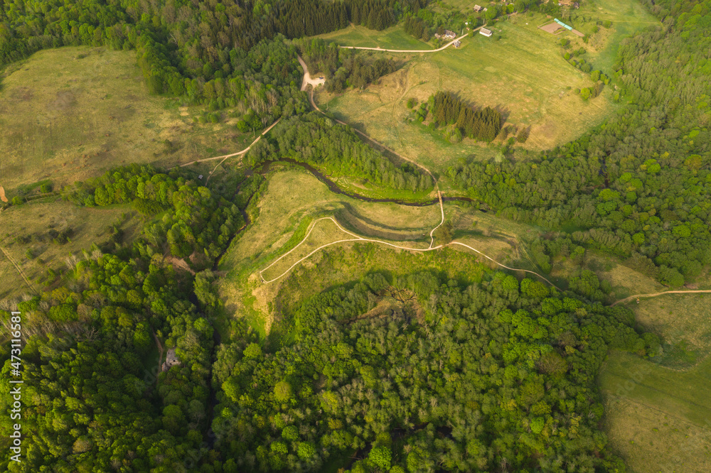 Drone view of summer hill and tourist nature trail Drone view of summer hill and tourist nature trail