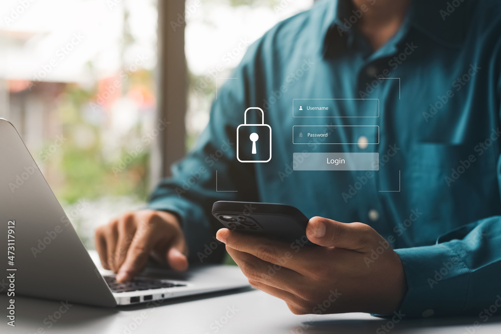 © Thapana_Studio - Cybersecurity and privacy concepts to protect data. Lock icon and internet network security technology. Businessmen protecting personal data on smartphone and virtual interfaces. © Thapana_Studio - Cybersecurity and privacy concepts to protect data. Lock icon and internet network security technology. Businessmen protecting personal data on smartphone and virtual interfaces.