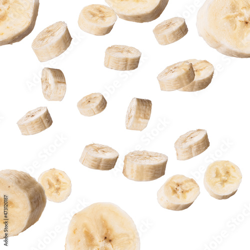  Slices of banana flying isolated on a white background