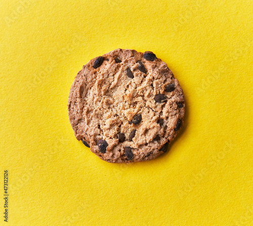  Delicious chocolate cookie on a yellow background