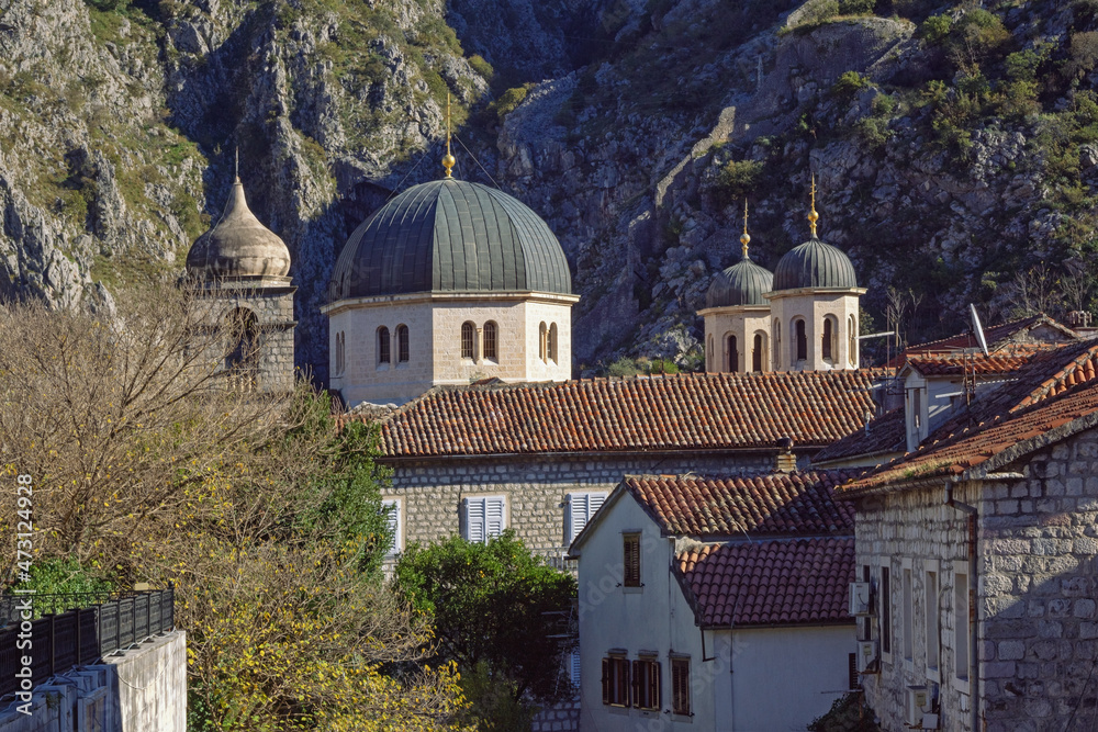 Religious architecture. Domes of churches. Montenegro. View of Old Town of Kotor on sunny November day