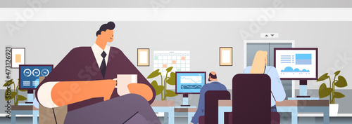 businessman drinking coffee business man having coffee break office interior horizontal portrait