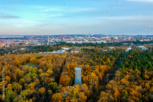 Splendid lookout tower next to veszperm city in Hungary. Fantastic fall mood in this photo. Vezprem cityscape on the background © GezaKurkaPhotos