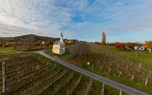 Amazing little chapel near by lake Balaton in Hungary. Next to Lencseitsvand town.Amazing autunm mood with grape fields. This building name is virgin Maria Chapel. Hungarian name is Szűz Mária kápolna photo