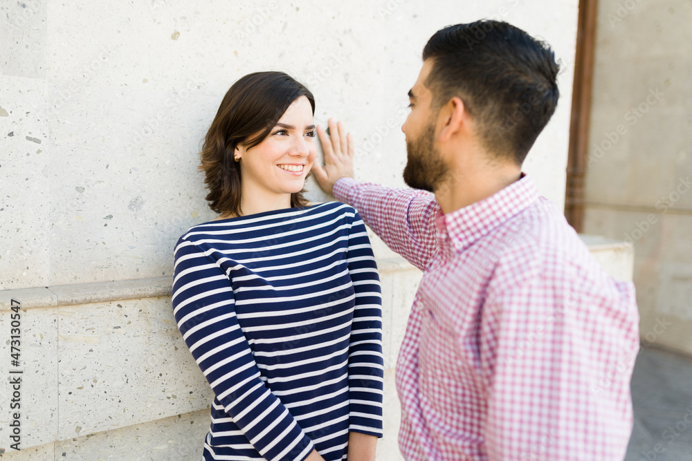 Flirty man asking on a date a young woman
