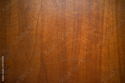 The texture of the wooden countertop.Vintage mahogany with scratches. Wooden background.
