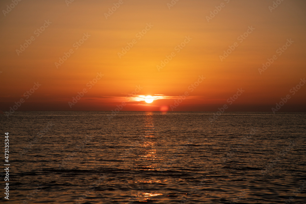 Sunset at sea, sun at sunset
