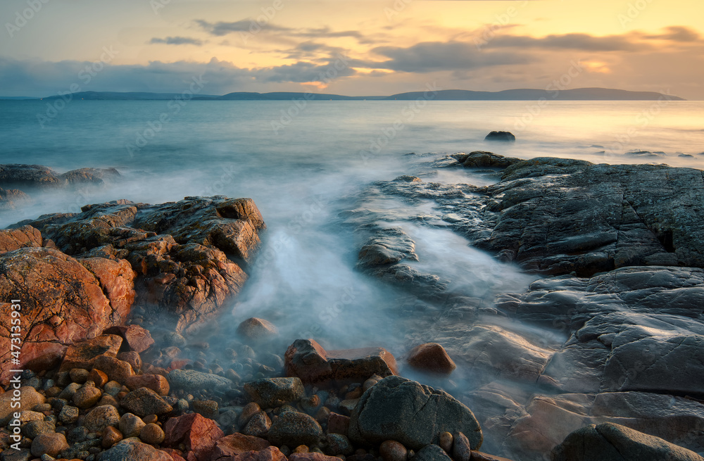 Beautiful seascape sunset scenery of rocky coast at wild atlantic way in county Galway, Ireland 