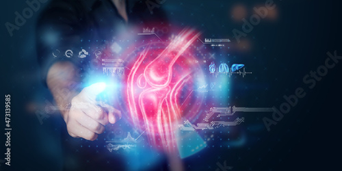 X-ray of a sore knee  hologram of joints  structure of the knee. X-ray image  trauma  rheumatologist consultation  skeletal image  medicine of the future.