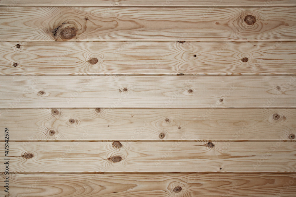 fragment of a fence made of old wooden boards with remnants of paint and nails, natural texture, background fragment of a fence made of old wooden boards with remnants of paint and nails, natural texture, background