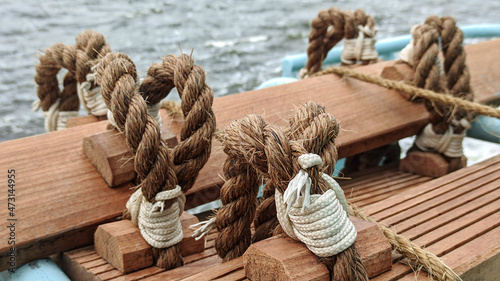 Obraz na plátně Stormtrap made of Manila rope, fixed on board the ship near the rail