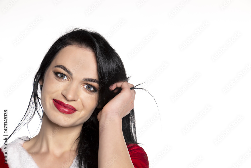 Donna mora con vestito da babbo natale Donna mora con vestito da babbo natale
