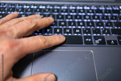 hand and finger on the spacebar and touchbar button photo