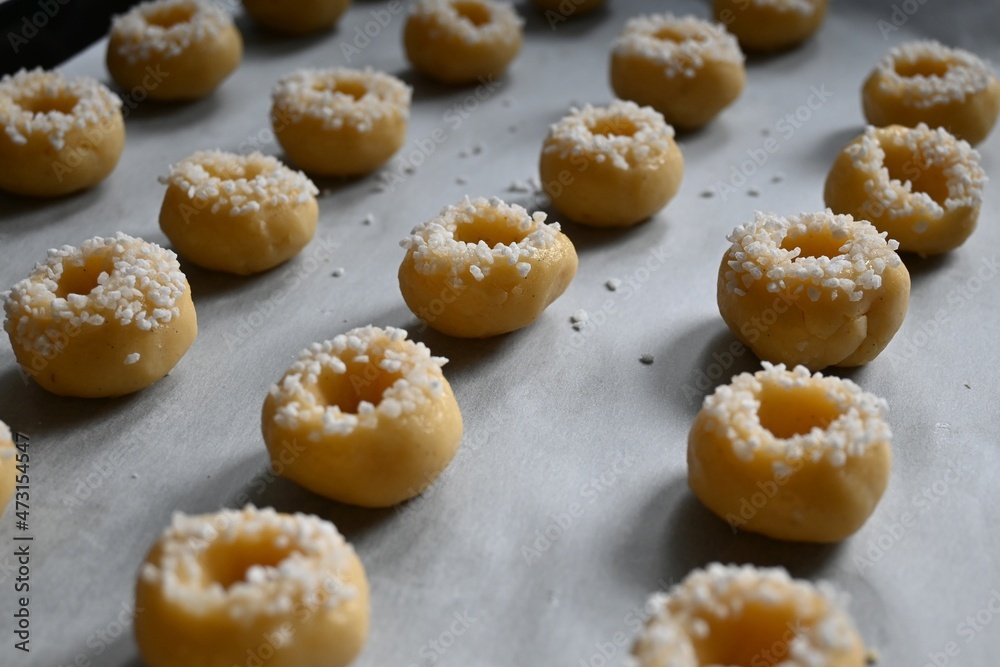 Preparing fresh made cookies or biscuits for Christmas