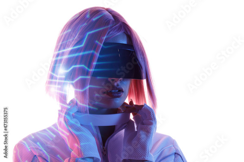 Double exposure of woman and futuristic holographic interface to display data. Female in futuristic costume using VR helmet. Augmented reality, future technology, game concept. White background.